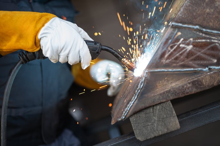 Professional welder working with precision